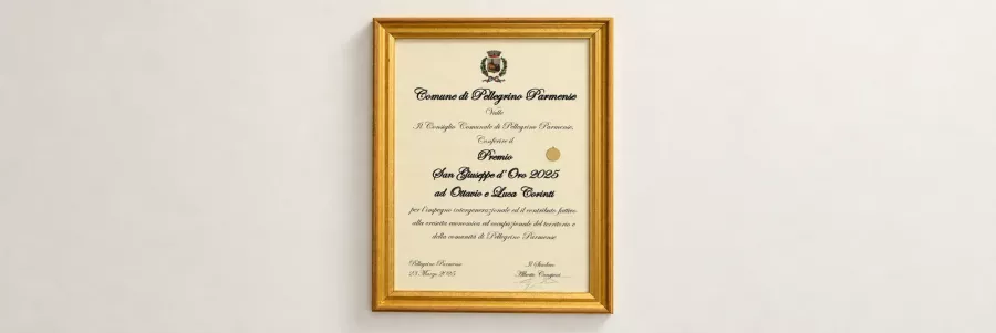 Il diploma del Premio San Giuseppe d'Oro 2025 conferito a Ottavio e Luca Corinti, appeso alla parete